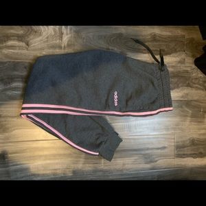 Women’s adidas joggers with pink stripes